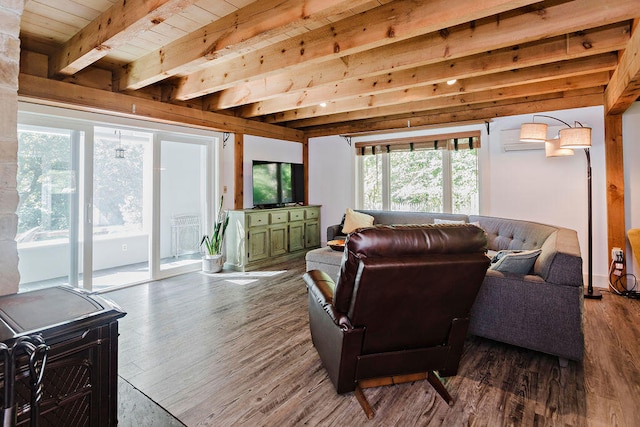 living room with hardwood / wood-style flooring, plenty of natural light, wooden ceiling, and beamed ceiling