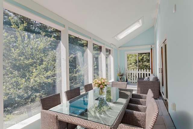 sunroom / solarium with lofted ceiling