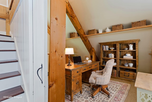 office area featuring beam ceiling