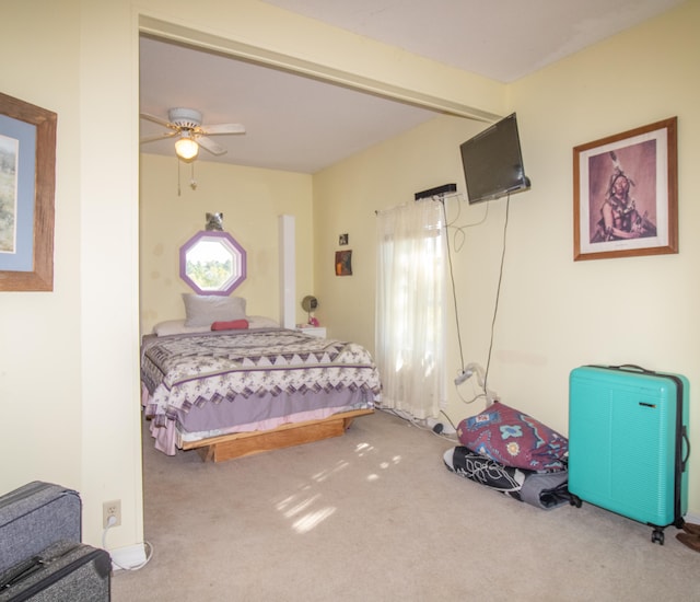 bedroom featuring ceiling fan and carpet flooring