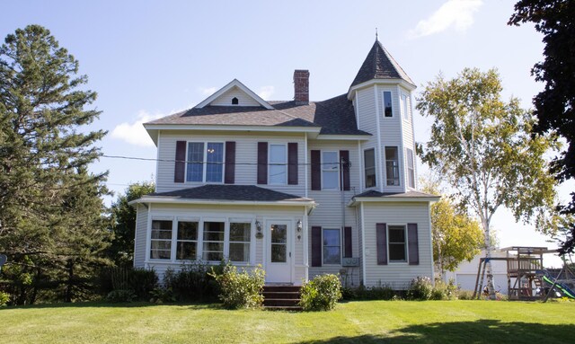 exterior space with a front yard