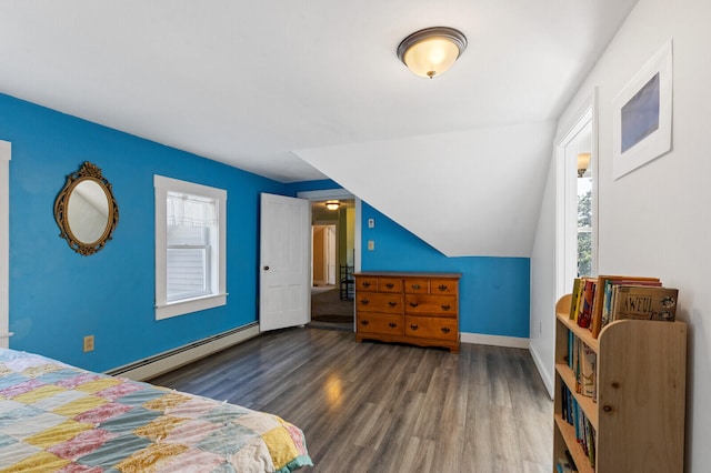 bedroom featuring dark hardwood / wood-style flooring and baseboard heating