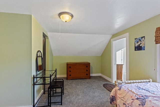 carpeted bedroom with vaulted ceiling