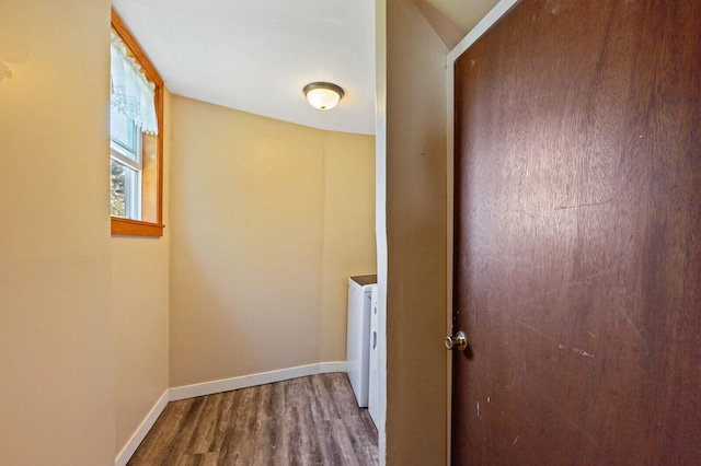 washroom featuring washer and dryer and hardwood / wood-style flooring