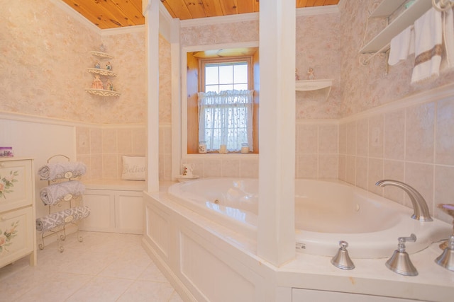 bathroom featuring a bath, tile patterned flooring, wood ceiling, and ornamental molding