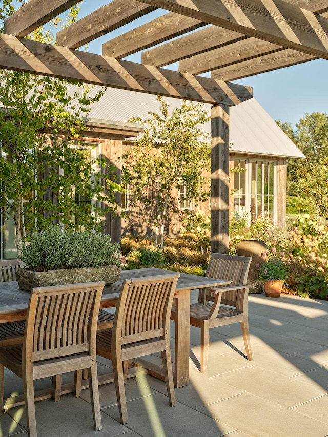 76 N St, Kennebunkport, ME 04046 - view of patio with outdoor dining space and a pergola