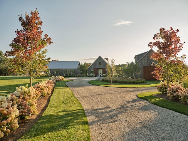 view of community featuring a lawn