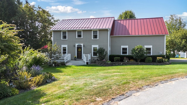 view of front of home with a front lawn