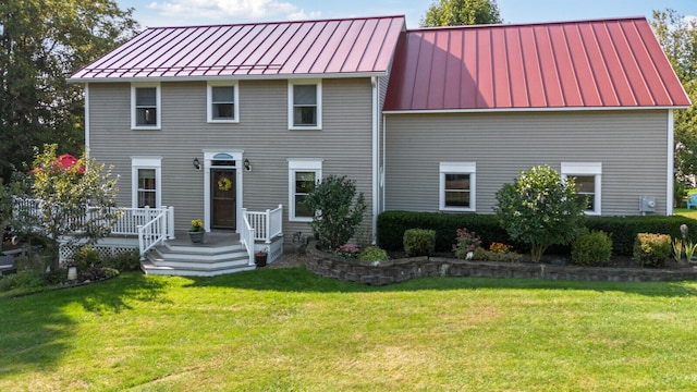 view of front of house featuring a front lawn