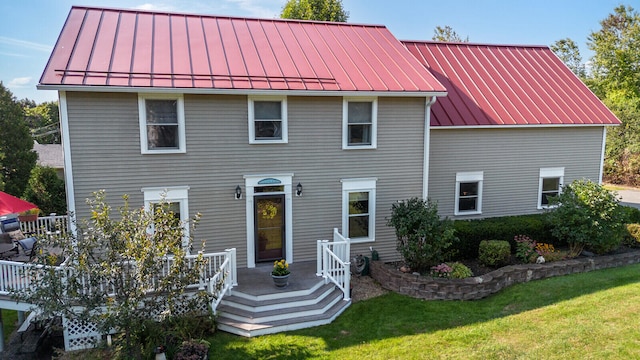 view of front of house with a front lawn