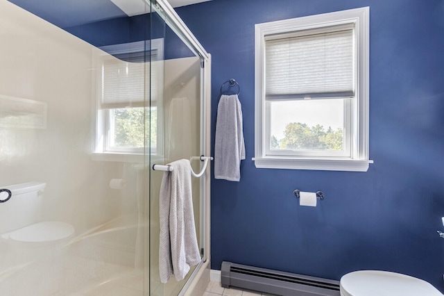 bathroom featuring a baseboard radiator, toilet, an enclosed shower, and tile patterned floors