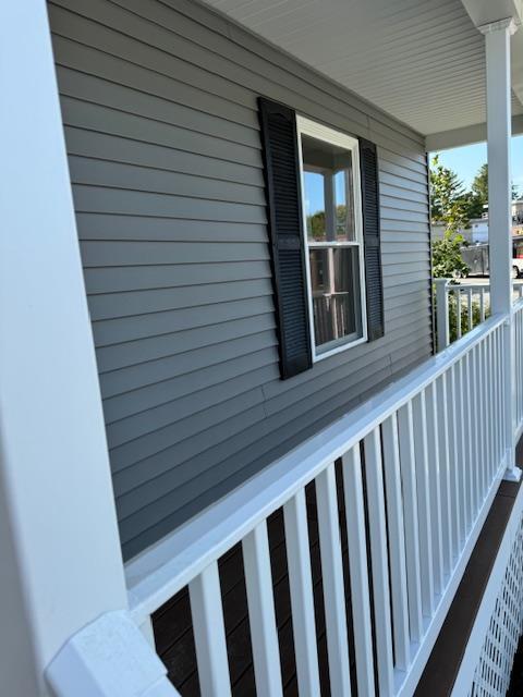 view of home's exterior with covered porch