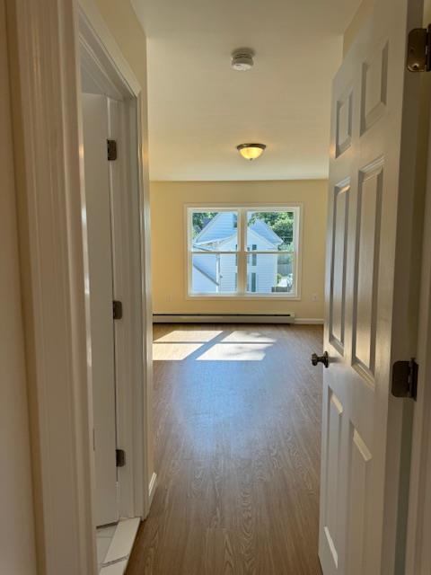 hallway featuring light wood-type flooring