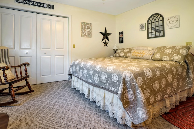 carpeted bedroom with a closet