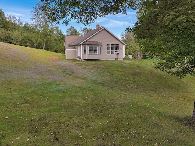 exterior space with a lawn