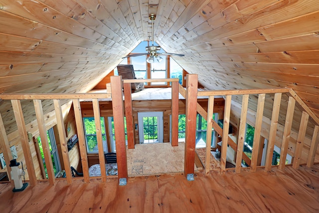 interior space with wood-type flooring, vaulted ceiling, and ceiling fan