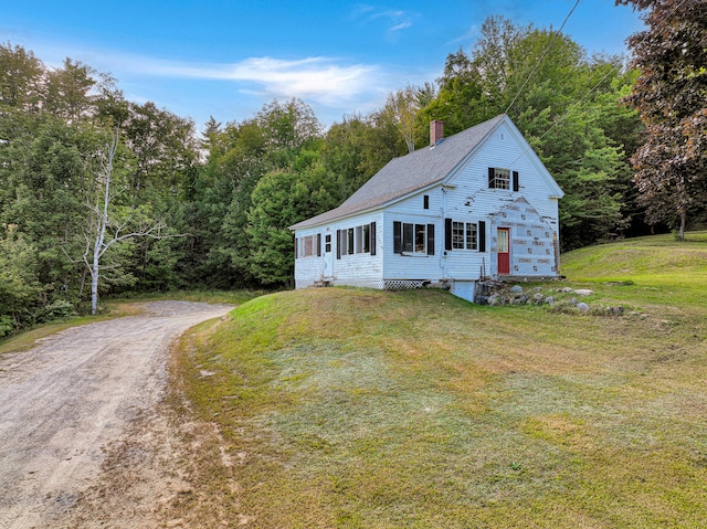 view of front of house with a front yard