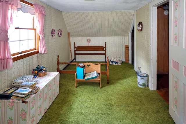 carpeted bedroom with vaulted ceiling