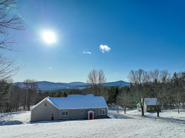 exterior space featuring a mountain view