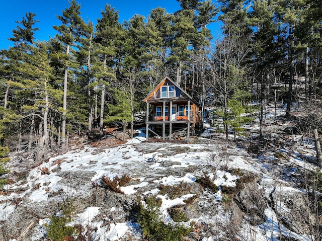 view of snow covered house