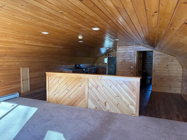 bonus room featuring lofted ceiling, dark hardwood / wood-style flooring, wood ceiling, and wooden walls