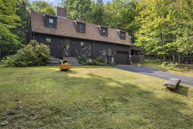 view of front of home with a front yard