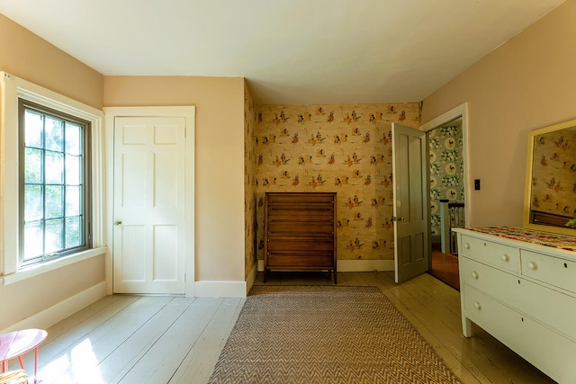 bedroom with light hardwood / wood-style flooring