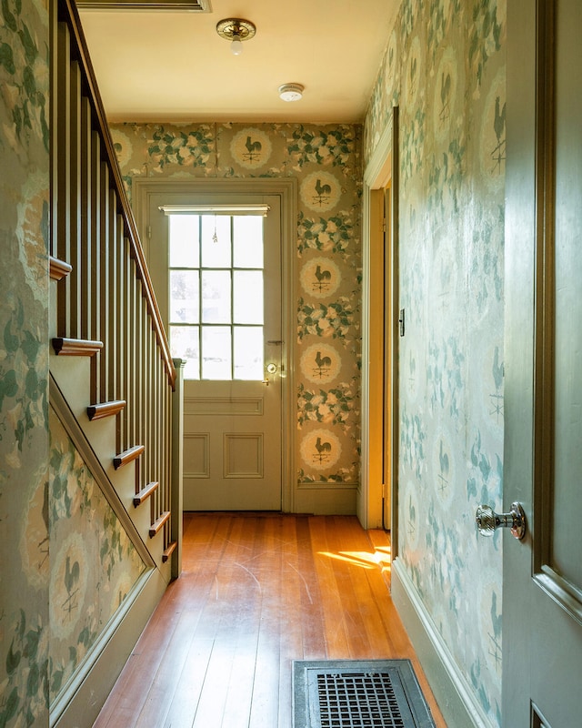 doorway to outside featuring light hardwood / wood-style floors