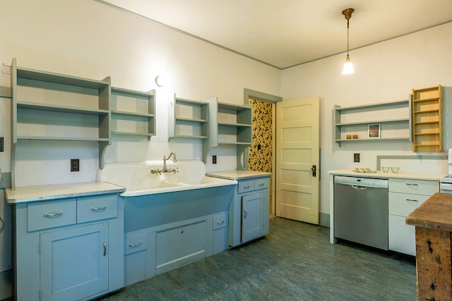 kitchen with blue cabinets, pendant lighting, and stainless steel dishwasher