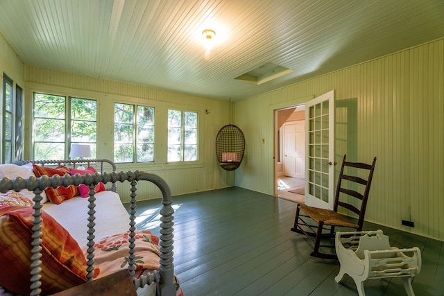 interior space featuring french doors, wood-type flooring, and a wealth of natural light