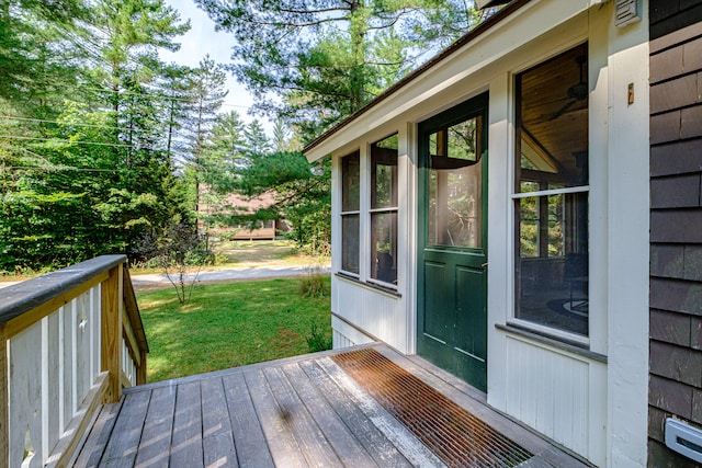 deck featuring a lawn