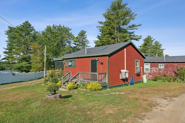 1270 Lakeview Dr Unit 23, China, ME 04358 - view of front of home featuring a wooden deck and roof with shingles