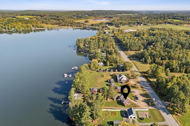 1270 Lakeview Dr Unit 23, China, ME 04358 - aerial view of property and surrounding area featuring a nearby body of water and a heavily wooded area