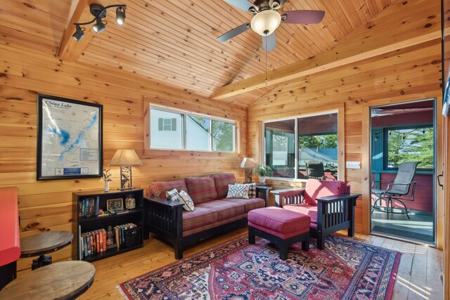 1270 Lakeview Dr Unit 23, China, ME 04358 - living area featuring lofted ceiling, wood ceiling, track lighting, hardwood / wood-style floors, and plenty of natural light