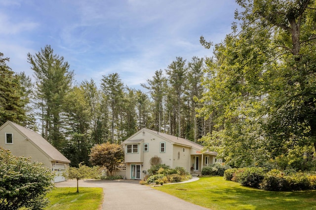48 Camrock Dr, Rockport, ME 04856 - view of front of property featuring a front yard, a garage, and driveway