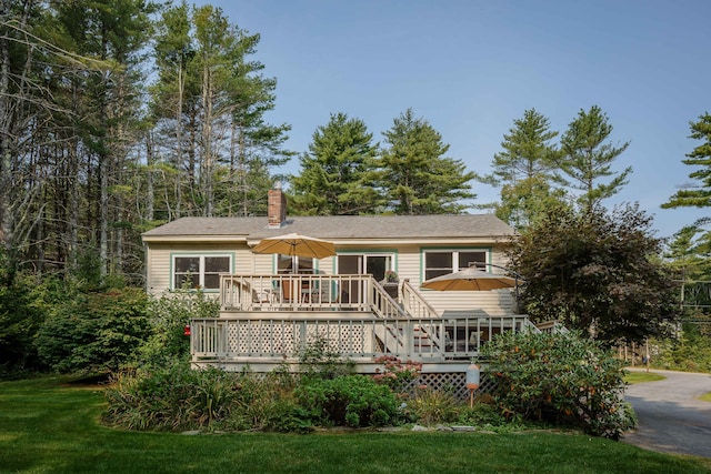 48 Camrock Dr, Rockport, ME 04856 - rear view of house featuring a wooden deck and a chimney