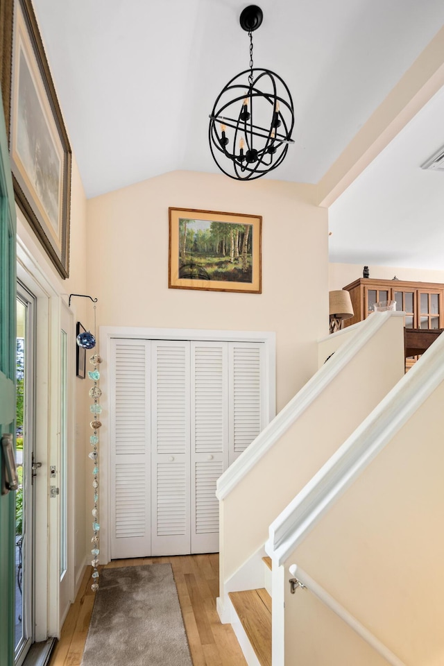 48 Camrock Dr, Rockport, ME 04856 - foyer with a chandelier, light wood-style flooring, and vaulted ceiling