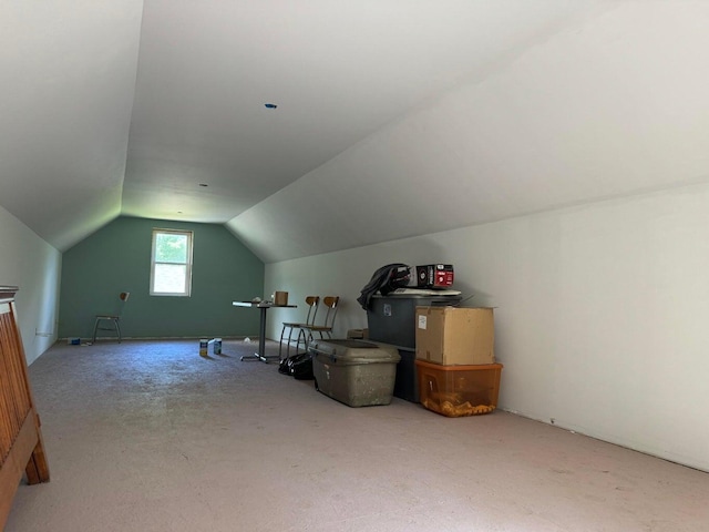 bonus room featuring vaulted ceiling