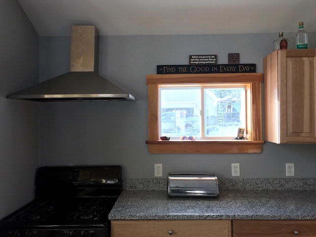 kitchen with black range with gas cooktop and wall chimney range hood