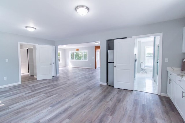 12 Sunset Ln, Otis, ME 04605 - interior space featuring light wood-type flooring and baseboards