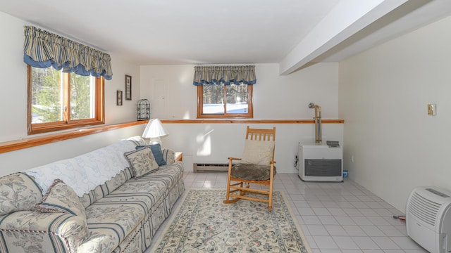 living room featuring a baseboard radiator and light tile patterned floors