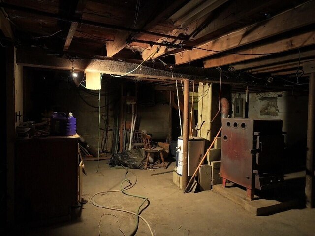 basement featuring water heater