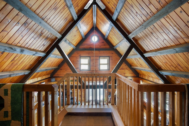 hallway featuring vaulted ceiling with beams and wooden ceiling