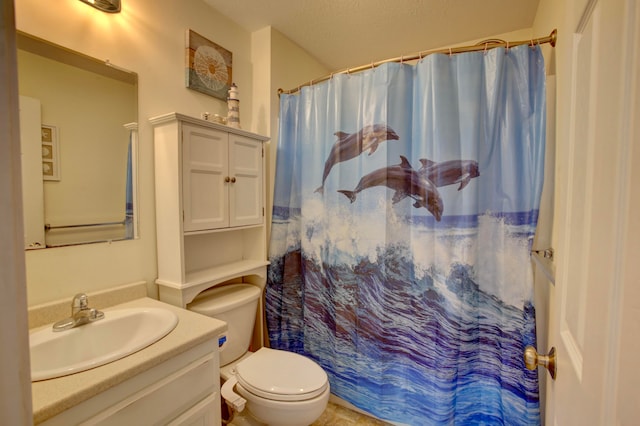 bathroom with walk in shower, a textured ceiling, vanity, and toilet