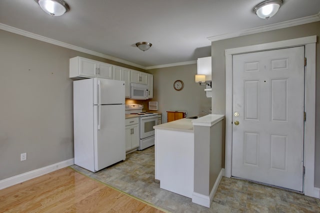 kitchen featuring crown molding, white appliances, white cabinetry, and sink