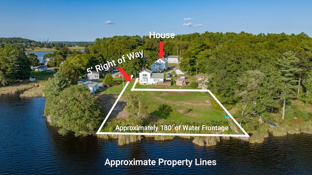 51 Main Rd, Phippsburg, ME 04562 - aerial view of property and surrounding area featuring property parcel outlined, a large body of water, and a forest