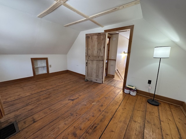 bonus room with hardwood / wood-style flooring