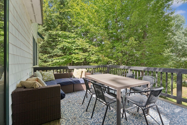 view of patio / terrace with a wooden deck and outdoor lounge area