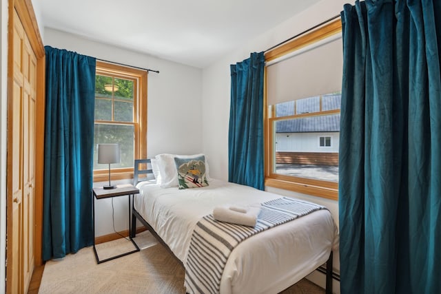 bedroom featuring a baseboard radiator