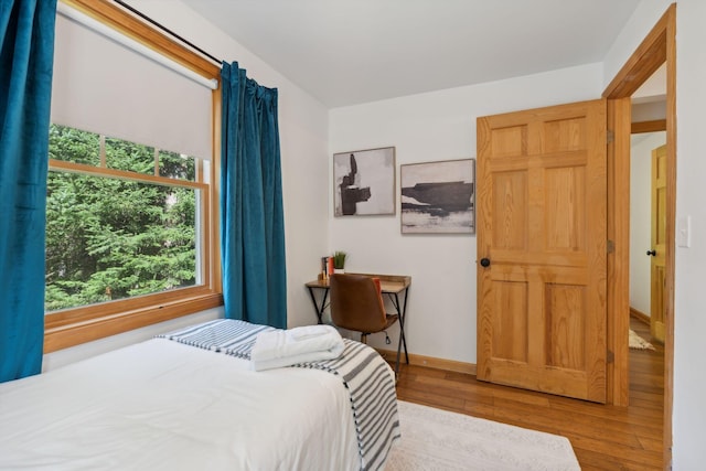 bedroom featuring light wood-type flooring